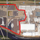 Most of the marked area is currently filled with Camaros and Cadillacs, waiting to be sold.